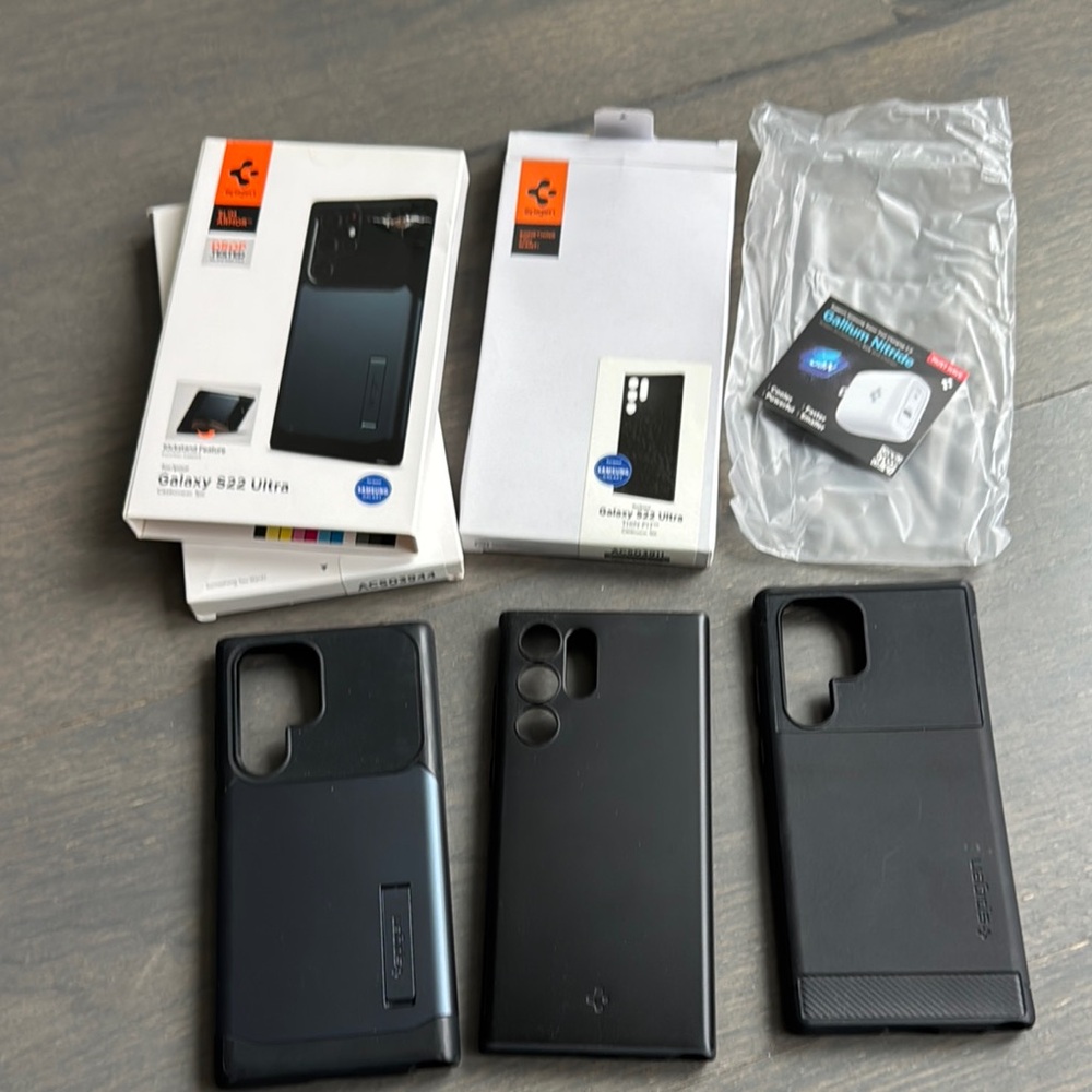 Spigen Galaxy S22 Ultra. 1 Black & Metallic night blue / 2 All black new Cases.